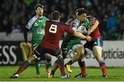 1 January 2015; Bundee Aki, Connacht, is tackled by CJ Stander, left, and Ronan O'Mahony, Munster. Connacht v Munster, Guinness PRO12 Round 12. Sportsground, Galway. Picture credit: Ramsey Cardy / SPORTSFILE