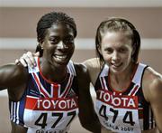 29 August 2007; Women's 400m final gold medallist Christine Ohuruogu, left, with silver medallist Nicola Sanders, both of Great Britain, after the race. The 11th IAAF World Championships in Athletics, Nagai Stadium, Osaka, Japan. Picture credit: Brendan Moran / SPORTSFILE *** Local Caption ***