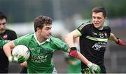 4 January 2015; Fermanagh's Eoin McManus in action against Sean Fox, QUB. Bank of Ireland Dr McKenna Cup Round 1, Fermanagh v QUB. Brewster Park, Enniskillen Co. Fermanagh. Picture credit: Philip Fitzpatrick/ SPORTSFILE