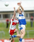 1 September 2007; Zac Tuohy, Laois, in action against Brendan Henry, Derry. ESB All-Ireland Minor Football Semi-Final Replay, Laois v Derry, Pairc Tailteann, Navan. Picture Credit; Paul Mohan / SPORTSFILE