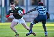 6 January 2015; Colin Byrne, Tullow Community School, is tackled by Bilal M'Uazzam, Castleknock College. Bank of Ireland Leinster Schools Vinny Murray Cup 1st Round, Tullow Community School v Castleknock College. Donnybrook Stadium, Donnybrook, Dublin. Picture credit: David Maher / SPORTSFILE