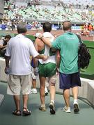 1 September 2007; Ireland's Jamie Costin is escorted back to the stadium by Pierce O'Callaghan, right, and team manager Patsy McGonigle, left, after pulling out of the Men's 50km Walk Final with an injury. The 11th IAAF World Championships in Athletics, Nagai Stadium, Osaka, Japan. Picture credit: Brendan Moran / SPORTSFILE