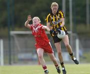 1 September 2007; Catriona Grace, Kilkenny, in action against Julie McLaughlin, Derry. TG4 All-Ireland Junior Ladies Football Championship Semi-Final, Kilkenny v Derry, Lawless Park, Fingallians, Swords. Picture credit: Ray Lohan / SPORTSFILE