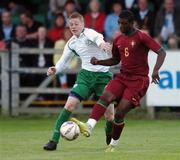 4 September 2007; Stelvio Cruz, Portugal, in action against James McCarthy, Republic of Ireland. U19 International Friendly, Republic of Ireland v Portugal, Belfield Park, Dublin. Picture credit; Paul Mohan / SPORTSFILE