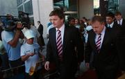 5 September 2007; Ireland captain Brian O'Driscoll and head coach Eddie O'Sullivan make their way to the team bus on the team's arrival at Bordeaux Airport ahead of the start of the Rugby World Cup which starts on Friday, with Ireland's first game on Sunday next against Namibia in Bordeaux. 2007 Rugby World Cup, Bordeaux Airport, Bordeaux, France. Picture credit: Brendan Moran / SPORTSFILE *** Local Caption ***