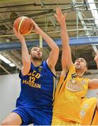 9 January 2015; Neil Baynes, UCD Marian, in action against Stephen King, UL Eagles. Basketball Ireland Men's National Cup Semi-Final, UCD Marian v UL Eagles. Mardyke Arena, Cork. Picture credit: Brendan Moran / SPORTSFILE