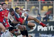 10 January 2015; Simon Zebo, Munster, is tackled by Luca Redolfini and Andrea Manici, Zebre. Guinness PRO12 Round 13, Zebre v Munster, Stadio XXV Aprile, Parma, Italy. Picture credit: Roberto Bregani / SPORTSFILE