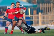 10 January 2015; Simon Zebo, Munster, is tackled by Filippo Ferrarini, Zebre. Guinness PRO12 Round 13, Zebre v Munster, Stadio XXV Aprile, Parma, Italy. Picture credit: Roberto Bregani / SPORTSFILE