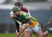 11 January 2015; Stephen Quirke, Offaly, in action against Eoin Price, Westmeath. Bord na Mona Walsh Cup, Group 4, Round 1, Westmeath v Offaly, Cusack Park, Mullingar, Co. Westmeath. Picture credit: Pat Murphy / SPORTSFILE