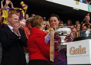 9 September 2007; Wexford captain Mary Leacy is presented with the O'Duffy Cup by Gary Desmond, CEO, Gala Retail Services, and Liz Howard, President of the Camogie Association. Gala All-Ireland Senior Camogie Final, Cork v Wexford, Croke Park, Dublin. Picture credit; Pat Murphy / SPORTSFILE