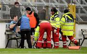 11 January 2015; Pádraig Harnan, UCD, receives medical treatment after picking up an injury. Bord na Mona O'Byrne Cup, Group B, Round 3, Kildare v UCD. St Conleth's Park, Newbridge, Co. Kildare. Picture credit: Piaras Ó Mídheach / SPORTSFILE