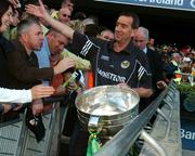 16 September 2007; Pat O'Shea, Kerry manager, celebrates at the end of the game with the Sam Maguire. Bank of Ireland All-Ireland Senior Football Championship Final, Kerry v Cork, Croke Park, Dublin. Picture credit; David Maher / SPORTSFILE