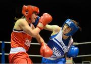 17 January 2015; Grainne Walsh, Sparticus, left, exchanges punches with Kelly Harrington, St Margarets, during their 64Kg bout. National Elite Boxing Championships, Semi-Finals. National Stadium, Dublin. Picture credit: Pat Murphy / SPORTSFILE