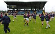 29 September 2007; The famous Croke Park's Nally Stand, which has been re-erected and replicated in the Pairc Colmcille in Tyrone. Photographed at the rededication and official opening of The Nally Stand are the Balla club warming up. Carrickmore, Co. Tyrone. Picture credit; Michael Cullen / SPORTSFILE