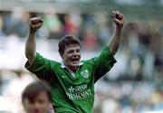 19 March 2000; Brian O'Driscoll of Ireland celebrates at the final whistle after the Six Nations Rugby Championship match between France and Ireland at the Stade de France in Paris, France. Photo by Ray Lohan/Sportsfile *** Local Caption ***