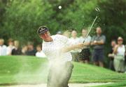 1 August 1999; Darren Clarke chips out of the bunker onto the 13th green during day three of the Smurfit European Open at the K-Club in Straffan, Kildare. Photo by Ray Lohan/Sportsfile