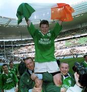 19 March 2000; Brian O'Driscoll of Ireland celebrates after the final whistle after the Six Nations Rugby Championship match between France and Ireland at the Stade de France in Paris, France. Photo by Ray Lohan/Sportsfile
