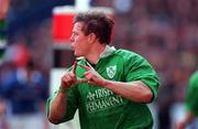 19 March 2000; Brian O'Driscoll of Ireland celebrates scoring his third try during the Six Nations Rugby Championship match between France and Ireland at the Stade de France in Paris, France. Photo by Matt Browne/Sportsfile   *** Local Caption ***