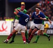 19 March 2000; Mick Galwey of Ireland is tackled by Arnaud Costes of France during the Six Nations Rugby Championship match between France and Ireland at the Stade de France in Paris, France. Photo by Matt Browne/Sportsfile