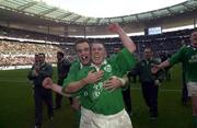19 March 2000; Ireland players Kevin Maggs, left and  Peter Stringer celebrate after the Six Nations Rugby Championship match between France and Ireland at the Stade de France in Paris, France. Photo by Matt Browne/Sportsfile
