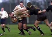 12 February 2000; Frank Sheahan of Cork Constitution is tackled by Gary Longwell of Ballymena during the AIB League Division 1 match between Ballymena and Cork Constitution at Eaton Park in Ballymena, Antrim. Photo by Matt Browne/Sportsfile