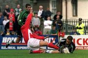 21 August 1999; Sligo Rovers goalkeeper Matt Boswell is tackled by Gerald Dobbs of City City during the Eircom League Premier Division match between Cork City and Sligo Rovers at Turners Cross in Cork. Photo by Damien Eagers/Sportsfile