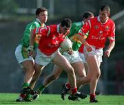 30 October 1999; Graham Canty of Cork in action against John McGlynn of Kerry during the Church & General National Football League Division 1A Round 1 match between Cork and Kerry at Páirc Uí Rinn in Cork. Photo by Brendan Moran/Sportsfile