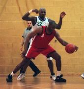 7 November 1999. Randall Mounts of Tolka Rovers in action against Roscoe Patterson of Waterford Crystal during the ESB Men's Superleague Basketball match between Tolka Rovers and Waterford Crystal at Griffith Avenue in Dublin. Photo by Brendan Moran/Sportsfile