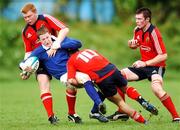 3 October 2007; David Joyce, Leinster, is tackled by Darragh Cantillon, left, Andrew Burke, and Peter O'Mahony, right, Munster. Schools Interprovincial, Leinster Schools U19 v Munster Schools U19, Donnybrook, Dublin. Picture credit: Brian Lawless / SPORTSFILE