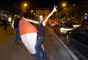 6 October 2007; A French fan celebrates her team's victory in the quarter-final in the streets of the capital. Rugby World Cup, Champs-Elysees, Paris, France. Picture credit: David Gibson / SPORTSFILE