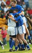 7 October 2007; Tullamore goalkeeper Ken Furlong, 1, celebrates with team-mates Cathal Daly, Gary Heffernan, and Mark Conlon at the final whistle. Offaly Senior Football Championship Final, Shamrocks v Tullamore, O'Connor Park, Tullamore, Co Offaly. Picture credit; Maurice Doyle / SPORTSFILE