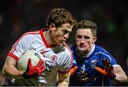 24 January 2015; Niall McKenna, Tyrone, in action against Joshua Hayes, Cavan. McKenna Cup Final, Tyrone v Cavan, Athletic Grounds, Armagh. Picture credit: Oliver McVeigh / SPORTSFILE