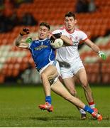 24 January 2015; Killian Clarke, Cavan, in action against Padraig McNulty, Tyrone. McKenna Cup Final, Tyrone v Cavan, Athletic Grounds, Armagh. Picture credit: Oliver McVeigh / SPORTSFILE