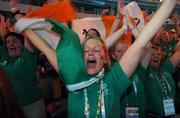 2 October 2007; Clodagh Dunne, a Team Ireland volunteer, from Clonmel, Co. Tipperary, cheers the Irish team into the stadium during the opening ceremony of the 2007 Special Olympics World Summer Games, Shanghai Stadium, Shanghai, China. Picture credit: Ray McManus / SPORTSFILE