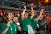 2 October 2007; Clara Hutchinson, Carlow Town, Carlow, left and Clodagh Dunne, Clonmel, Co. Tipperary, await the arrival of Team Ireland into the stadium during the opening ceremony of the 2007 Special Olympics World Summer Games, Shanghai Stadium, Shanghai, China. Picture credit: Ray McManus / SPORTSFILE