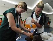 3 October 2007; Aisling O'Brien, Sandycove, Dublin, left, with coach Louise O'Toole, during a break in divisioning in advance of the Basketball finals. 2007 Special Olympics World Summer Games, Shanghai Jiaotong University Gymnasium, Shanghai, China. Picture credit: Ray McManus / SPORTSFILE