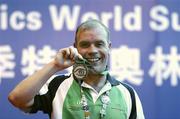 6 October 2007; Pat Monaghan, from Ballyfermot, Dublin, with the Silver medal he won in a 50m final. 2007 Special Olympics World Summer Games, Shanghai Pudong Natatorium, Shanghai, China. Picture credit: Ray McManus / SPORTSFILE  *** Local Caption ***