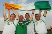 10 October 2007; Members of the victorious Team Ireland soccer team Darren Flanagan, 10, from Curragh, Co. Kildare, Donnacha O'Duinn, Tallaght, Dublin, and Adrian Clarke, Manor Cunningham, Co. Donegal, celebrate with head coach, Paul Martyn, second from left, after defeating France in a final. 2007 Special Olympics World Summer Games, Shanghai Songjiang Stadium, Shanghai, China. Picture credit: Ray McManus / SPORTSFILE