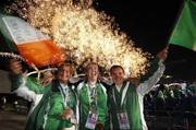 11 October 2007; Irish athletes Kathleen McMeel, from Bawnmore, Co. Limerick, Christine Kelly, Ballinasloe, Co. Galway, and Sean Keenan, Newtownforbes, Co. Longford, enjoy the Closing Ceremony. 2007 Special Olympics World Summer Games, Shanghai Jiangwan Stadium, Shanghai, China. Picture credit: Ray McManus / SPORTSFILE