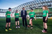 1 February 2015; Republic of Ireland Manager Martin O’Neill, with children, from left: Paul Delaney, age 13, from Killeagh, Co.Cork; Rachel Moran, age 11, from Summerhill, Co.Meath; Luke Moran, age 12, from Summerhill, Co.Meath; and Laura Sproule, age 12, from Castlefinn, Co.Donegal, at the Aviva Stadium where SPAR were announced as the Official Convenience Retail Partner of the FAI.  SPAR are also the new title sponsor of the Primary School 5’s Programme; a national five aside competition for boys and girls in 4th, 5th and 6th classes. Picture credit: David Maher / SPORTSFILE