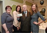 2 February 2015; Members of the Irish Motor Neurone Disease Association, from left to right, Tracey Hutchin, Gemma Watts and Maeve Leahy with Jimmy 'The Memory Man' Magee after they received a cheque in favour of the Irish Motor Neurone Disease Association from Sportsfile's Ray McManus. Sportsfile had earlier promised to donate €1 to the Irish Motor Neurone Disease Association for every retweet of their birthday message to Jimmy 'The Memory Man' Magee. Goat Bar & Restaurant, Goatstown, Dublin. Picture credit: Brendan Moran / SPORTSFILE