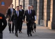 3 February 2015; Conor Ridge, front left, arriving at the high court for the afternoon sitting of the High Court case involving golfer Rory McIlroy and his former agents Horizon Management. Picture credit: Pat Murphy / SPORTSFILE