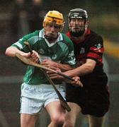 4 November 2007; Eoin Reid, Ballyhale Shamrocks, is tackled by David Phelan, Mount Leinster Rangers. AIB Leinster Club Hurling Championship Quarter Final, Mount Leinster Rangers v Ballyhale Shamrocks, Dr Cullen Park, Carlow. Picture credit; Ray McManus / SPORTSFILE