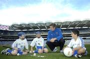 1 November 2007; At the launch of the 2007 Kellogg’s GAA Games Development Conference, from left Eoin Connolly, age 11, St.Jude's, Templeogue, Dublin, David Kiernan, age 11, St. Jude's, Templeogue, Dublin, Mayo footballer Conor Mortimer and Shane Malone, age 10, St Michael's, Galway City. The two-day coaching conference supported by Kellogg's will be held on November the 23rd and 24th in Croke Park. The conference will offer 800 delegates from nine countries the opportunity to hear talks relating to some of the most challenging aspects attached to the development of Gaelic Games. GAA Museum, Croke Park, Dublin. Picture credit: Brian Lawless / SPORTSFILE