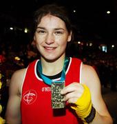 3 November 2007; Katie Taylor, Ireland, celebrates with her gold medal after victory over Katie Dunn, Canada. International Women's Contest at the end of the AIBA World Boxing Championships Chicago 2007, Katie Taylor.v. Katie Dunn, University of Illinois, Chicago Pavilion, Chicago, USA. Picture credit: David Maher / SPORTSFILE