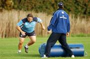 6 November 2007; Leinster prop Ollie Le Roux during some rucking practice watched by head coach Michael Cheika at squad training ahead of their first Heineken Cup game on Saturday next. Leinster rugby squad training, Belfield, Dublin. Picture credit: Brendan Moran / SPORTSFILE *** Local Caption ***