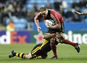 10 November 2007; Mick O'Driscoll, Munster, is tackled by Eoin Reddan, London Wasps. Heineken Cup, Pool 5, Round 1, London Wasps v Munster, Ricoh Arena, Foleshill, Coventry, England. Picture credit; Matt Browne / SPORTSFILE