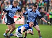 11 November 2007; Fabien O'Neill, Dromore, in action against Michael Walsh and Conor Garvey, Mayobridge. AIB Ulster Club Football Championship Quarter-Final Replay, Mayobridge v Dromore, Pairc Esler, Newry, Co. Down. Picture credit; Oliver McVeigh / SPORTSFILE