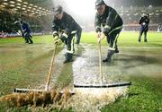 17 November 2007; Firemen clear the water off the pitch prior to the game. 2008 European Championship Qualifier, Northern Ireland v Denmark, Windsor Park, Belfast, Co. Antrim. Picture credit; Oliver McVeigh / SPORTSFILE