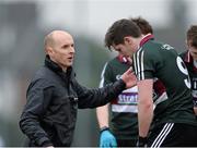 11 February 2015; St Mary's College, Belfast, manager Paddy Tally consoles Emmett Bradley after the final whistle. Independent.ie Sigerson Cup, Quarter-Final, St Mary's College, Belfast v DCU. St Genevieves High School, Belfast, Co. Antrim. Picture credit: Oliver McVeigh / SPORTSFILE